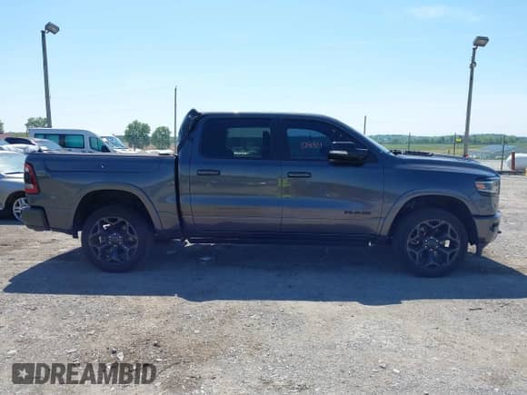 2022 Ram 1500 Limited z VIN 1C6SRFHT5NN332002, wystawiony jako IAAI lot #42230884 z przebiegiem 71 759 mil mil oraz . Historia ofert i sprzedaży dostępna na DreamBid. Obrazek 13.