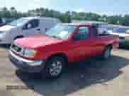 1999 Nissan Frontier XE with VIN 1N6DD26S9XC322264, listed as a IAAI auction lot 42867874 with 230,481 mi miles and . Bid and sale history available at DreamBid. Image 2.