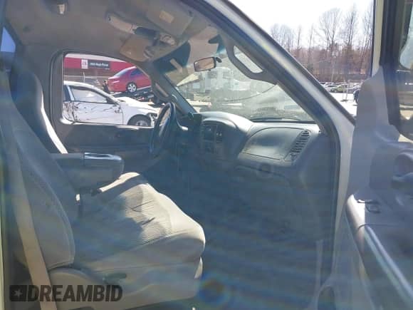 2000 Ford F-150 XL with VIN 1FTRF18W2YNB42014, listed as a IAAI auction lot 41827247 with Not provided miles and . Bid and sale history available at DreamBid. Image 5.