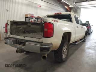 2016 Chevrolet Silverado 2500HD Work Truck z VIN 1GC1KUE80GF124569, wystawiony jako IAAI lot #42915578 z przebiegiem 115 052 mil mil oraz . Historia ofert i sprzedaży dostępna na DreamBid. Obrazek 4.