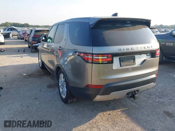 2017 Land Rover Discovery HSE z VIN SALRRBBV7HA046036, wystawiony jako IAAI lot #43238640 z przebiegiem 85 594 mil mil oraz . Historia ofert i sprzedaży dostępna na DreamBid. Obrazek 3.