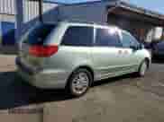 2010 Toyota Sienna XLE с VIN 5TDYK4CCXAS303876, выставлен на аукционе Copart как лот 81272115 с пробегом 170 141 миль миль и Списание • Salvage title. История ставок и продаж доступна на DreamBid. Изображение 3.