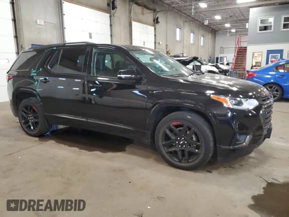 2020 Chevrolet Traverse Premier with VIN 1GNEVKKW3LJ119834, listed as a Copart auction lot 81997115 with 55,111 mi miles and Salvage title. Bid and sale history available at DreamBid. Image 4.