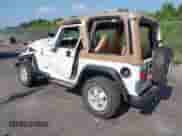 1998 Jeep Wrangler SE z VIN 1J4FY29P5WP712092, wystawiony jako IAAI lot #43019438 z przebiegiem 100 843 mil mil oraz . Historia ofert i sprzedaży dostępna na DreamBid. Obrazek 3.