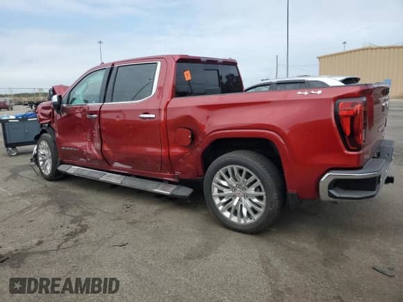 2025 GMC Sierra 1500 SLT with VIN 3GTUUDED8SG191318, listed as a Copart auction lot 82421985 with 4,487 mi miles and Salvage title. Bid and sale history available at DreamBid. Image 2.