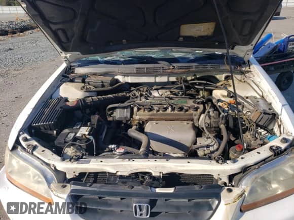 1999 Honda Accord EX z VIN 1HGCG3271XA026598, wystawiony jako Copart lot #72608294 z przebiegiem 244 838 mil mil oraz Szkoda całkowita • Salvage title. Historia ofert i sprzedaży dostępna na DreamBid. Obrazek 12.