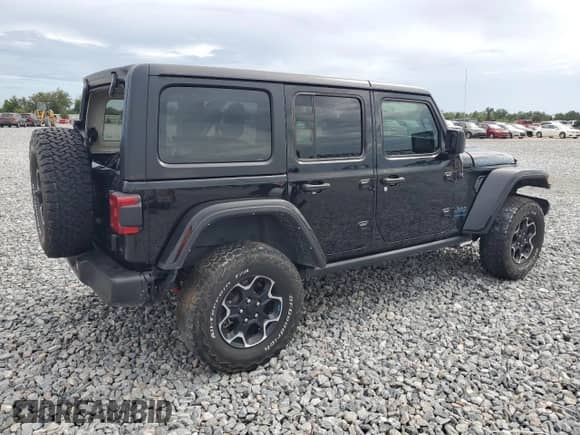 2023 Jeep Wrangler Rubicon с VIN 1C4JJXR6XPW599482, выставлен на аукционе Copart как лот 70442005 с пробегом 33 321 миль миль и Списание • Salvage title. История ставок и продаж доступна на DreamBid. Изображение 3.