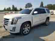 2015 Cadillac Escalade Premium with VIN 1GYS4NKJ3FR642288, listed as a Copart auction lot 71497575 with 131,574 mi miles and Salvage title. Bid and sale history available at DreamBid. Image 1.