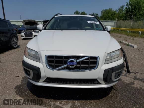 2012 Volvo XC70 T6 z VIN YV4902BZ2C1142036, wystawiony jako Copart lot #60450775 z przebiegiem 190 909 mil mil oraz Czysty tytuł • Clean title. Historia ofert i sprzedaży dostępna na DreamBid. Obrazek 5.