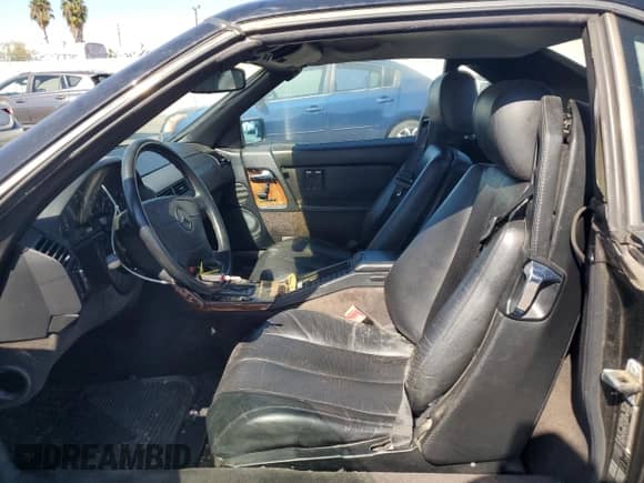 1992 Mercedes-Benz SL с VIN WDBFA66E1NF058408, выставлен на аукционе Copart как лот 75694294 с пробегом 169 308 миль миль и Чистый • Clean title. История ставок и продаж доступна на DreamBid. Изображение 7.