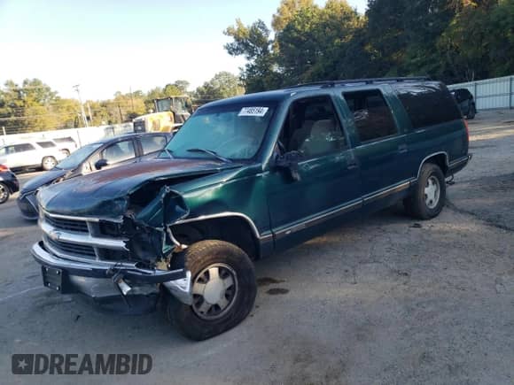 1997 Chevrolet Suburban z VIN 3GNEC16R6VG167319, wystawiony jako Copart lot #77485194 z przebiegiem 188 479 mil mil oraz Szkoda całkowita • Salvage title. Historia ofert i sprzedaży dostępna na DreamBid. Obrazek 1.