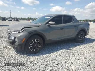 2022 Hyundai Santa Cruz SEL с VIN 5NTJB4AE6NH031488, выставлен на аукционе Copart как лот 70936615 с пробегом 32 558 миль миль и Списание • Salvage title. История ставок и продаж доступна на DreamBid. Изображение 1.
