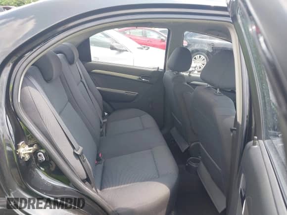 2007 Chevrolet Aveo LS with VIN KL1TD56627B055436, listed as a IAAI auction lot 42462092 with 102,923 mi miles and . Bid and sale history available at DreamBid. Image 8.