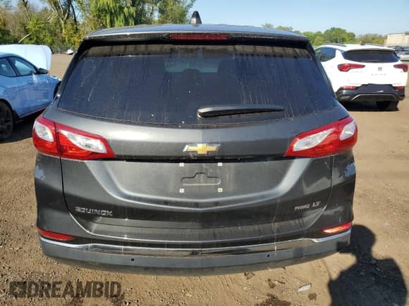 2021 Chevrolet Equinox LT с VIN 3GNAXUEV1ML369512, выставлен на аукционе Copart как лот 70850055 с пробегом 69 829 миль миль и Списание • Salvage title. История ставок и продаж доступна на DreamBid. Изображение 6.