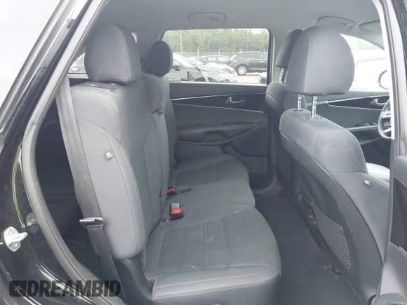 2019 Kia Sorento L with VIN 5XYPG4A30KG569597, listed as a IAAI auction lot 43304146 with 183,758 mi miles and . Bid and sale history available at DreamBid. Image 8.