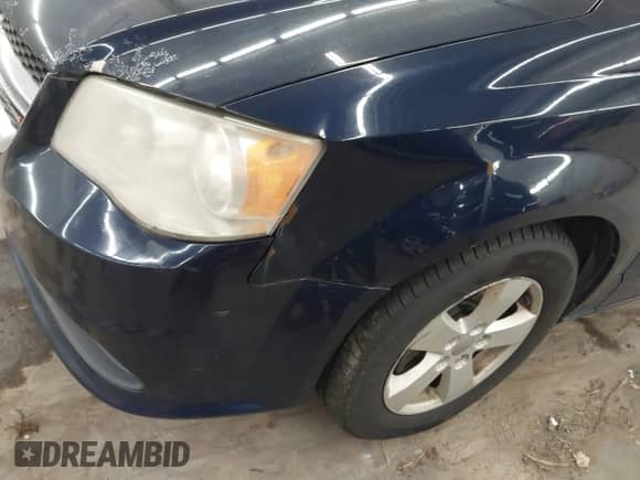 2014 Dodge Grand Caravan SE with VIN 2C4RDGBG8ER100018, listed as a IAAI auction lot 43506142 with 224,863 mi miles and . Bid and sale history available at DreamBid. Image 6.