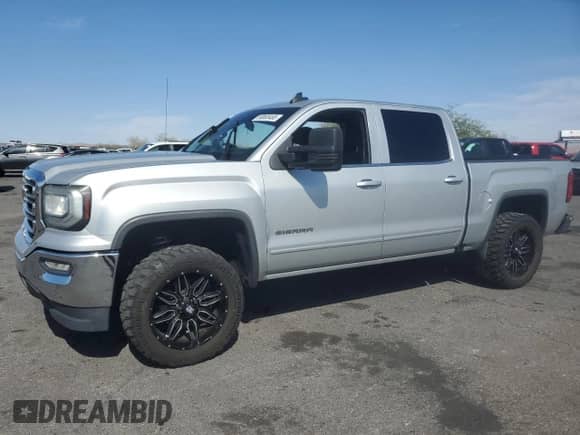 2016 GMC Sierra 1500 SLE with VIN 3GTP1MEC6GG216754, listed as a Copart auction lot 58865465 with Not provided miles and Salvage title. Bid and sale history available at DreamBid. Image 1.