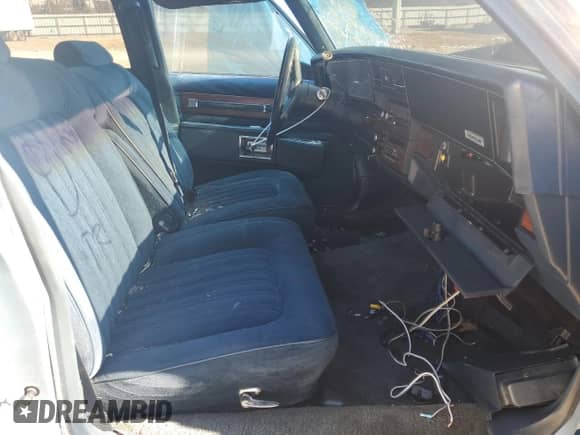 1987 Chevrolet Caprice Classic with VIN 1G1BN51HXHX145814, listed as a Copart auction lot 43583355 with 33,452 mi miles and Clean title. Bid and sale history available at DreamBid. Image 7.