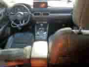 2023 Mazda CX-5 S Select with VIN JM3KFBBM0P0285688, listed as a Copart auction lot 67590615 with 28,029 mi miles and Salvage title. Bid and sale history available at DreamBid. Image 8.