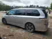 2012 Toyota Sienna SE with VIN 5TDXK3DCXCS232461, listed as a Copart auction lot 64729635 with 128,192 mi miles and Salvage title. Bid and sale history available at DreamBid. Image 2.