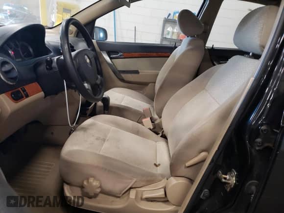 2007 Chevrolet Aveo LT с VIN KL1TG566X7B054185, выставлен на аукционе Copart как лот 74776014 с пробегом 152 148 миль миль и Списание • Salvage title. История ставок и продаж доступна на DreamBid. Изображение 7.