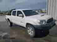 2015 Toyota Tacoma z VIN 3TMLU4EN9FM196670, wystawiony jako Copart lot #89926135 z przebiegiem 184 579 mil mil oraz Szkoda całkowita • Salvage title. Historia ofert i sprzedaży dostępna na DreamBid. Obrazek 4.
