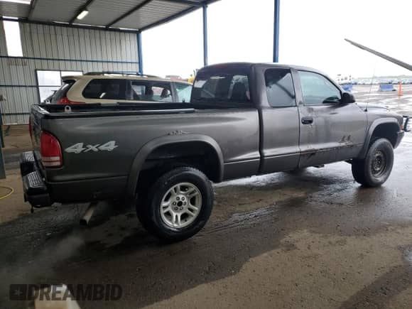 2004 Dodge Dakota с VIN 1D7HG12K44S556475, выставлен на аукционе Copart как лот 82159875 с пробегом 148 437 миль миль и На запчасти • Non repairable. История ставок и продаж доступна на DreamBid. Изображение 3.