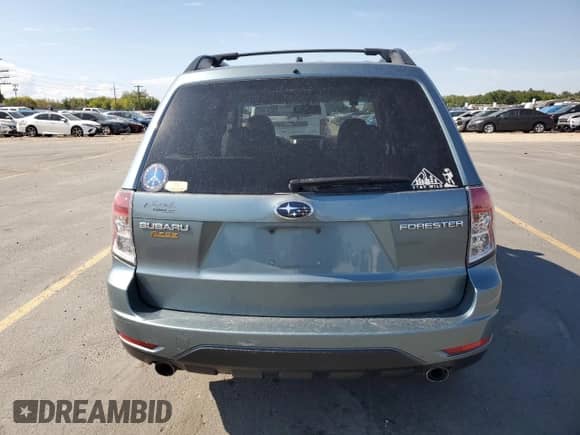 2009 Subaru Forester X Limited with VIN JF2SH64699H781877, listed as a Copart auction lot 80739605 with 187,368 mi miles and Salvage title. Bid and sale history available at DreamBid. Image 6.