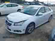 2013 Chevrolet Cruze LTZ z VIN 1G1PG5SB7D7224670, wystawiony jako IAAI lot #42814171 z przebiegiem 189 170 mil mil oraz . Historia ofert i sprzedaży dostępna na DreamBid. Obrazek 2.