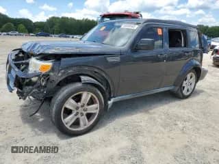 2011 Dodge Nitro Heat with VIN 1D4PT4GK1BW589213, listed as a Copart auction lot 58858565 with 202,844 mi miles and Salvage title. Bid and sale history available at DreamBid. Image 1.