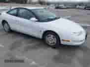 1999 Saturn SC с VIN 1G8ZY1271XZ276834, выставлен на аукционе IAAI как лот 41445985 с пробегом 62 428 миль миль и . История ставок и продаж доступна на DreamBid. Изображение 1.