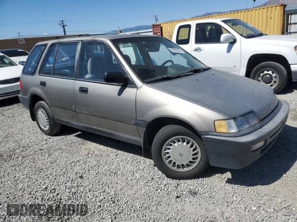 1990 Honda Civic with VIN JHMEE2752LS001520, listed as a Copart auction lot 50095545 with 456,252 mi miles and Salvage title. Bid and sale history available at DreamBid. Image 4.
