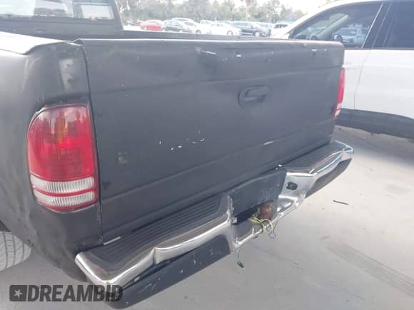 2004 Dodge Dakota SLT z VIN 1D7GL42N14S509052, wystawiony jako IAAI lot #43533936 z przebiegiem 230 657 mil mil oraz . Historia ofert i sprzedaży dostępna na DreamBid. Obrazek 12.