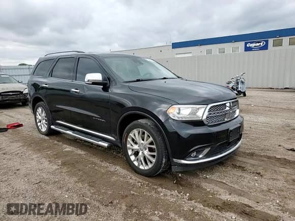 2014 Dodge Durango Citadel with VIN 1C4RDJEG1EC435770, listed as a Copart auction lot 80095035 with 174,669 mi miles and Salvage title. Bid and sale history available at DreamBid. Image 14.