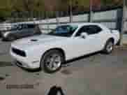 2023 Dodge Challenger SXT with VIN 2C3CDZAG0PH514863, listed as a Copart auction lot 87452795 with 51,682 mi miles and Salvage title. Bid and sale history available at DreamBid. Image 1.
