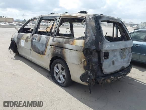 2008 Honda Odyssey Touring with VIN 5FNRL38928B018936, listed as a IAAI auction lot 43426095 with Not provided miles and . Bid and sale history available at DreamBid. Image 3.