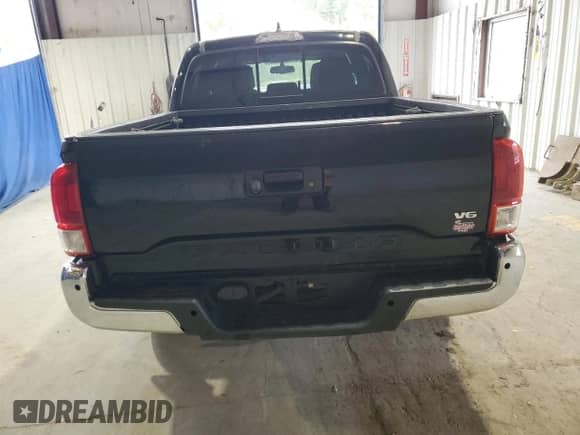 2017 Toyota Tacoma SR5 with VIN 5TFCZ5AN1HX052069, listed as a Copart auction lot 85709515 with 165,409 mi miles and Clean title. Bid and sale history available at DreamBid. Image 6.