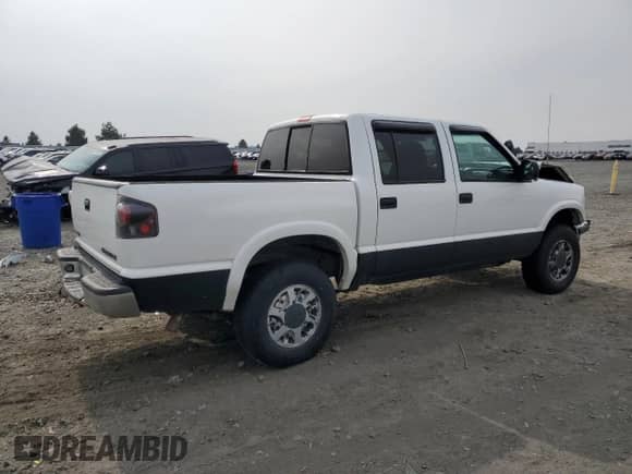 2001 Chevrolet S-10 LS с VIN 1GCDT13WX1K178759, выставлен на аукционе Copart как лот 84771365 с пробегом Не указан миль и Списание • Salvage title. История ставок и продаж доступна на DreamBid. Изображение 3.