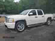 2012 Chevrolet Silverado 1500 LTZ with VIN 3GCPCTE04CG168708, listed as a Copart auction lot 54405354 with 156,487 mi miles and Salvage title. Bid and sale history available at DreamBid. Image 1.