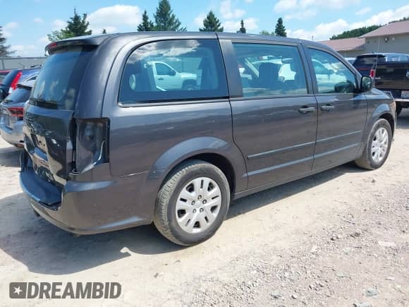 2016 Dodge Grand Caravan SE with VIN 2C4RDGBGXGR108916, listed as a IAAI auction lot 42980157 with 70,167 mi miles and . Bid and sale history available at DreamBid. Image 4.