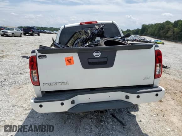 2021 Nissan Frontier SV с VIN 1N6ED0EA3MN706641, выставлен на аукционе Copart как лот 60455245 с пробегом 44 291 миль миль и Списание • Salvage title. История ставок и продаж доступна на DreamBid. Изображение 6.