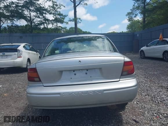 2002 Saturn SL с VIN 1G8ZH54802Z162216, выставлен на аукционе IAAI как лот 42711526 с пробегом 101 713 миль миль и . История ставок и продаж доступна на DreamBid. Изображение 16.