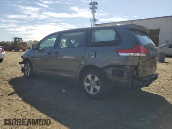 2012 Toyota Sienna with VIN 5TDZK3DC4CS184450, listed as a Copart auction lot 71284385 with 207,878 mi miles and Salvage title. Bid and sale history available at DreamBid. Image 2.