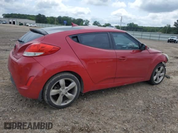 2013 Hyundai Veloster w/Black Int z VIN KMHTC6AD5DU173242, wystawiony jako Copart lot #54733125 z przebiegiem 157 766 mil mil oraz Czysty tytuł • Clean title. Historia ofert i sprzedaży dostępna na DreamBid. Obrazek 3.
