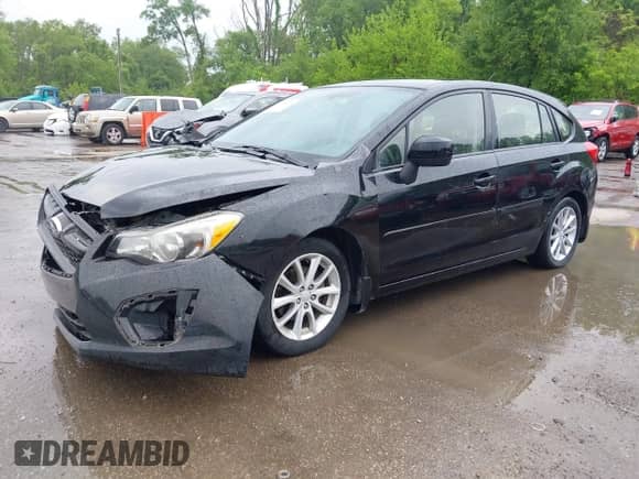 2012 Subaru Impreza Premium with VIN JF1GPAC65CH245193, listed as a IAAI auction lot 42204378 with 197,832 mi miles and . Bid and sale history available at DreamBid. Image 2.
