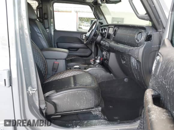 2023 Jeep Wrangler Sahara Altitude with VIN 1C4HJXEG0PW558839, listed as a IAAI auction lot 43001327 with 16,845 mi miles and . Bid and sale history available at DreamBid. Image 5.