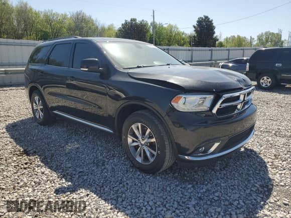 2014 Dodge Durango Limited with VIN 1C4SDJDT6EC558786, listed as a Copart auction lot 52459695 with 158,338 mi miles and Salvage title. Bid and sale history available at DreamBid. Image 4.