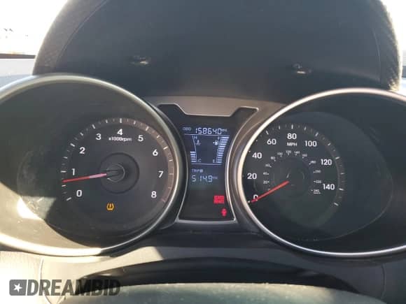 2013 Hyundai Veloster w/Black Int с VIN KMHTC6AD0DU166697, выставлен на аукционе Copart как лот 71646805 с пробегом 158 640 миль миль и Списание • Salvage title. История ставок и продаж доступна на DreamBid. Изображение 9.