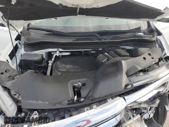 2021 Honda Pilot Touring 8-Passenger z VIN 5FNYF5H99MB039369, wystawiony jako Copart lot #69393035 z przebiegiem Nie podano mil oraz Szkoda całkowita • Salvage title. Historia ofert i sprzedaży dostępna na DreamBid. Obrazek 12.