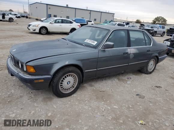 1988 BMW 7 Series with VIN WBAGC4314J3316435, listed as a Copart auction lot 82722494 with Not provided miles and Clean title. Bid and sale history available at DreamBid. Image 1.